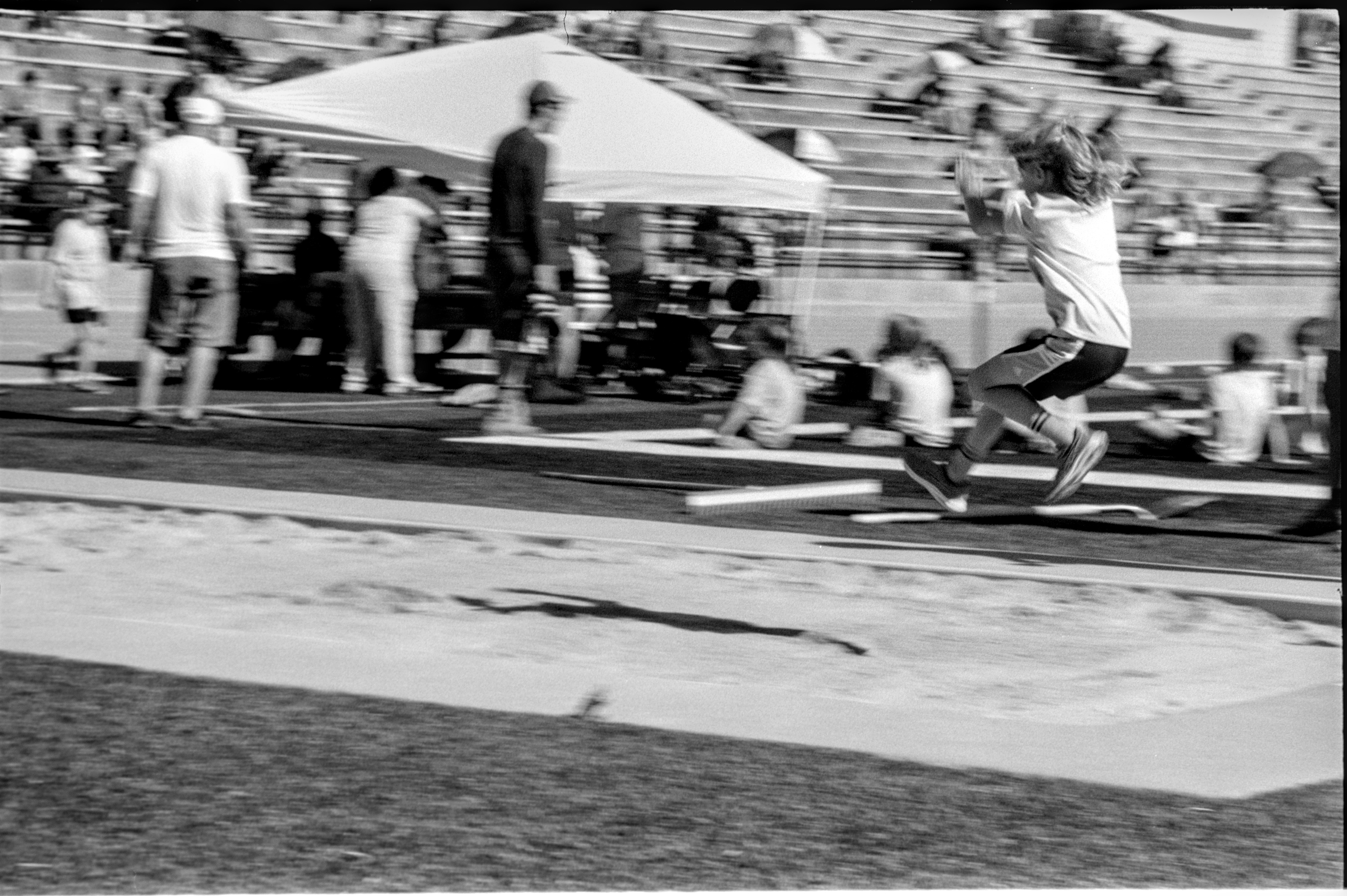 My son doing the long jump.

Leica M2